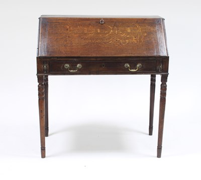 Lot 134 - A 19th Century oak desk, fitted beneath the...