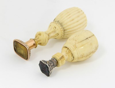 Lot 640 - A 19th Century ivory desk seal of reeded form,...