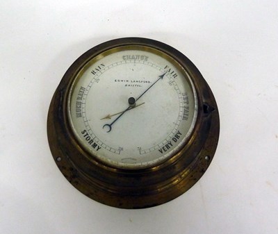Lot 653 - An aneroid barometer by Edwin Langford in a...