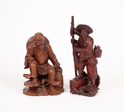 Lot 11 - Two Chinese wooden carvings of fishermen