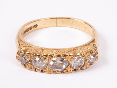 Lot 61 - An 18ct yellow gold and diamond five-stone ring
