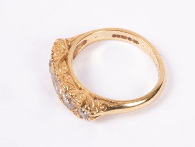 Lot 61 - An 18ct yellow gold and diamond five-stone ring