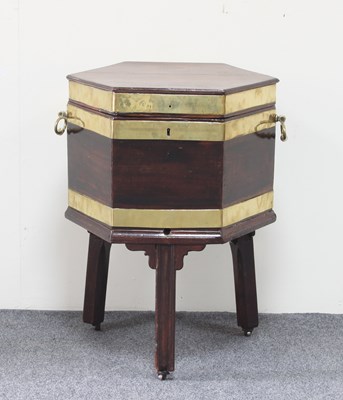 Lot 121 - A George III hexagonal mahogany and brass...