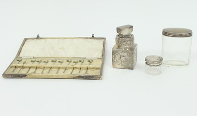 Lot 1054 - A silver mounted scent bottle, William Comyns,...