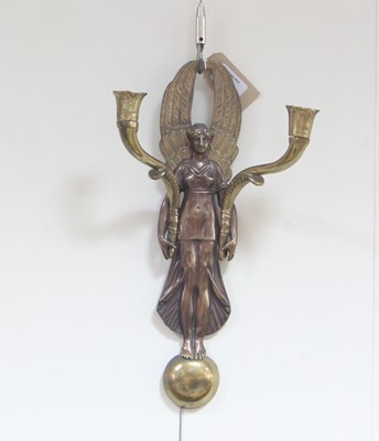 Lot 780 - A pair of bronze figural two-branch wall...