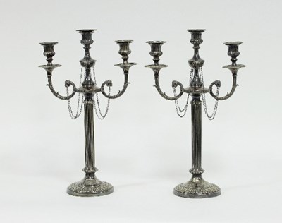 Lot 196 - A pair of silver plated two-branch three-light...