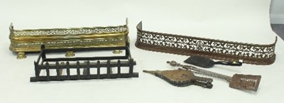 Lot 634 - A fire grate, two fire curbs, a pair of...