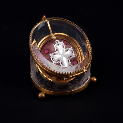 Lot 6 - An engraved glass watchstand with gilt metal...
