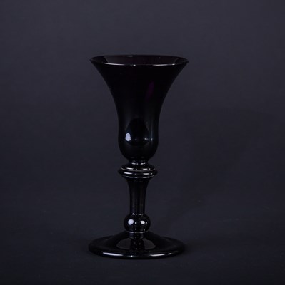 Lot 343 - An Edwardian amethyst wine glass with...