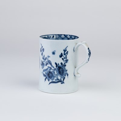 Lot 433 - An 18th Century Lowestoft blue and white mug...