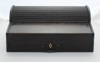 Lot 343 - An ebony writing box, circa 1820, with tambour...