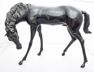 Lot 285 - A large bronze figure of a standing horse,...