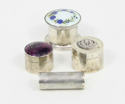 Lot 505 - A circular silver pill box, the cover with a...