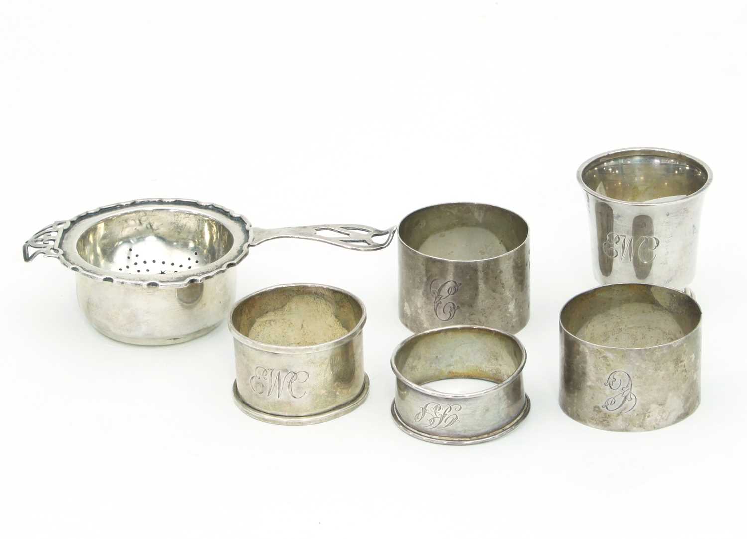 Lot 12 - A silver tea strainer and stand, Birmingham...