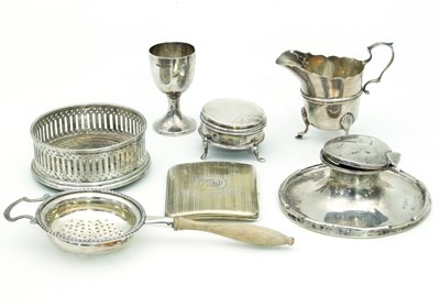 Lot 14 - A silver capstan inkwell, Birmingham 1910, a...