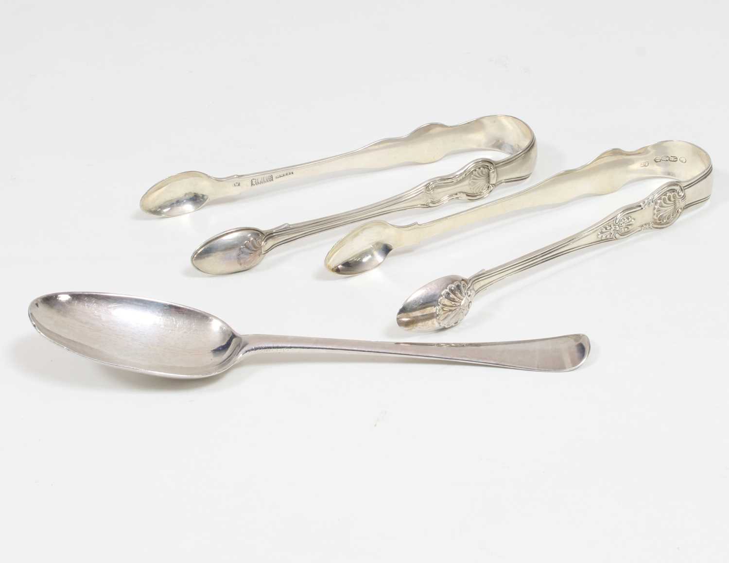 Lot 62 - A pair of Irish silver Queens pattern sugar...