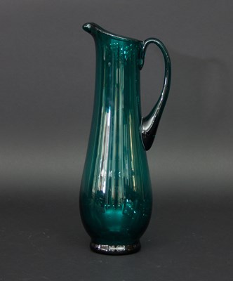 Lot 84 - An Art Deco style green glass jug, 36cm high
