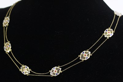 Lot 553 - A necklace, the double strand fine link chain...