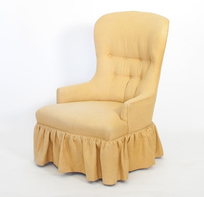 Lot 699 - A button upholstered tub chair