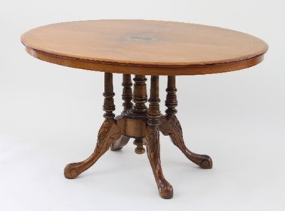 Lot 462 - A Victorian walnut oval loo table, with inlaid...