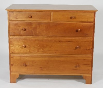 Lot 475 - A Shaker cherry wood chest of drawers of two...