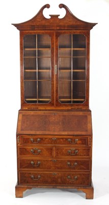 Lot 733 - A reproduction mahogany and burr wood bureau...