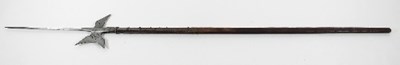 Lot 836 - A steel halberd on a wooden shaft with shaped...