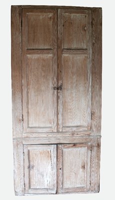 Lot 63 - An early 19th Century pine recess cupboard...