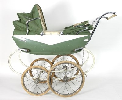 Lot 591 - A Triang twin pram with green hood and green...