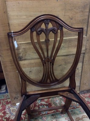 Lot 5 - Manner of Liberty & Co: An Arts and Crafts oak...
