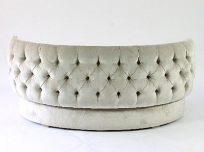 Lot 53 - A pale grey velvet sofa, with button...