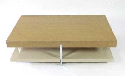 Lot 55 - A maple veneered coffee table of two tiers...