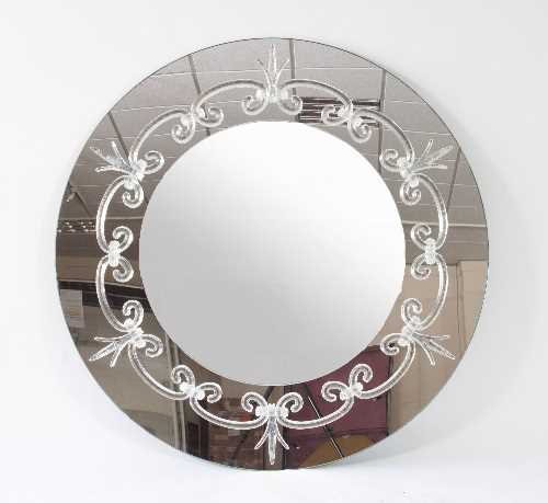 Lot 57 - A large circular mirror, the mirrored surround...