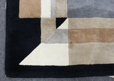 Lot 86 - A mid 20th Century rug with geometric design...