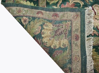 Lot 92 - An Arts and Crafts style carpet with bold...