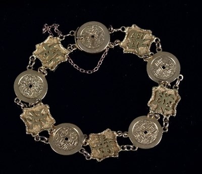 Lot 455 - A Chinese export gold bracelet, Wang Hing,...