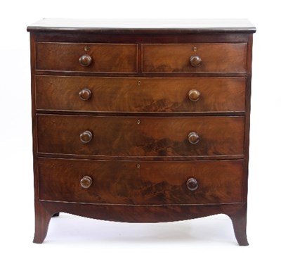 Lot 733 - An early 19th Century mahogany bowfront chest...