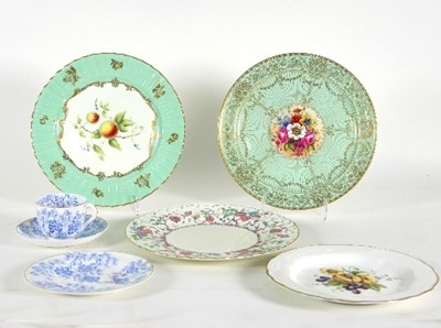 Lot 66 - Three Royal Worcester plates, decorated with...