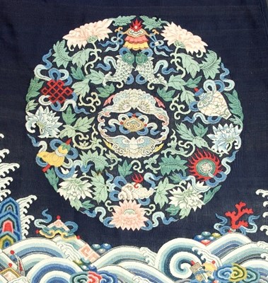 Lot 119 - A Chinese navy blue silk robe, late Qing,...