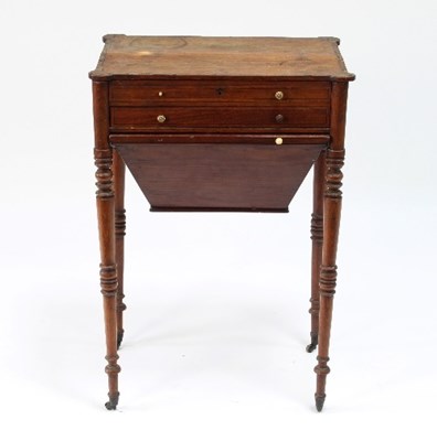 Lot 557 - A George IV rosewood work table, the top with...
