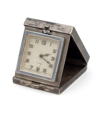 Lot 127 - A silver cased folding bedside clock, R&S,...