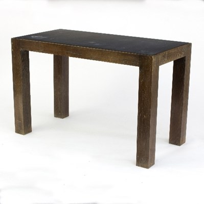 Lot 364 - A modern limed oak rectangular table with drop...