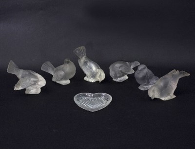 Lot 595 - Lalique, six glass models of birds and a heart...