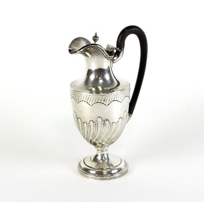 Lot 482 - A Victorian silver hot water jug, Charles...