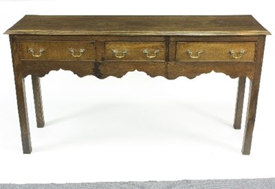 Lot 769 - An early 19th Century oak dresser fitted three...