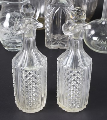 Lot 25 - A pair of double lipped cut glass decanters, a...