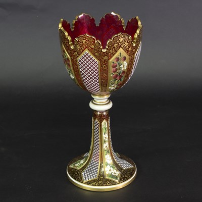 Lot 53 - A large Bohemian red glass goblet, decorated...