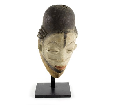 Lot 340 - A Punu mask, Gabon, with white face and...
