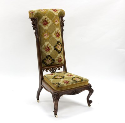Lot 545 - A Victorian walnut framed prie-dieu chair with...