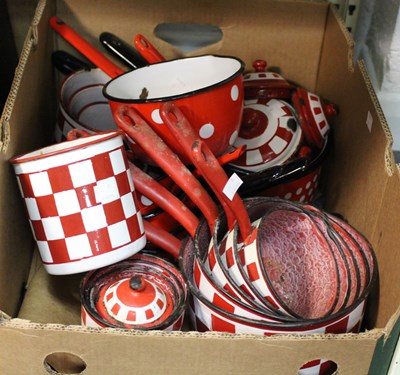 Lot 434 - A quantity of red and white enamel kitchenware...